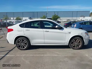 2017 BMW X4 M40i with VIN 5UXXW7C59H0U25191, listed as a IAAI auction lot 41867852 with 76,301 mi miles. Bid and sale history available at carsss.com. Image 13.