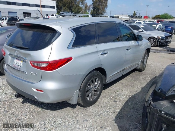 2015 Infiniti QX60 with VIN 5N1AL0MN1FC543104, listed as a IAAI auction lot 41870709 with 77,361 mi miles. Bid and sale history available at carsss.com. Image 4.