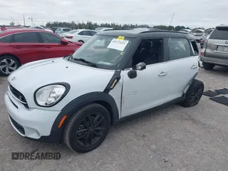 2015 MINI Countryman S z VIN WMWZC3C5XFWP53190, wystawiony jako IAAI lot #41273123 z przebiegiem 163 658 mil mil oraz . Historia ofert i sprzedaży dostępna na DreamBid. Obrazek 2.