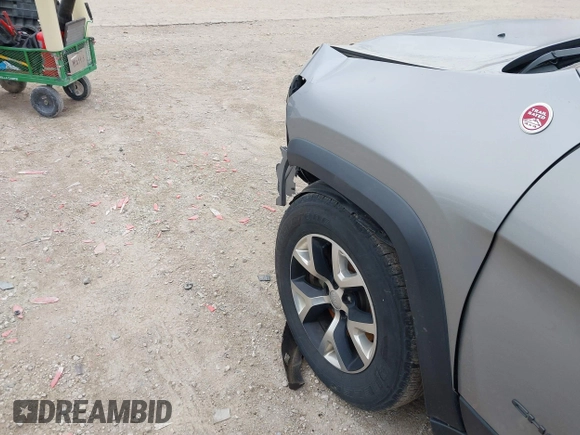 2016 Jeep Cherokee Trailhawk with VIN 1C4PJMBS7GW192574, listed as a IAAI auction lot 41986638 with 144,970 mi miles and . Bid and sale history available at DreamBid. Image 21.