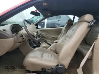1999 Ford Mustang GT z VIN 1FAFP45X8XF115199, wystawiony jako Copart lot #61419125 z przebiegiem 90 817 mil mil oraz Szkoda całkowita • Salvage title. Historia ofert i sprzedaży dostępna na DreamBid. Obrazek 7.