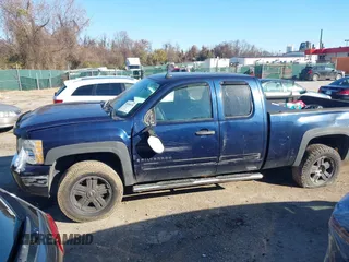 2009 Chevrolet Silverado 1500 LT with VIN 1GCEK29089Z264879, listed as a IAAI auction lot 40990010 with Not Provided miles and . Bid and sale history available at DreamBid. Image 13.