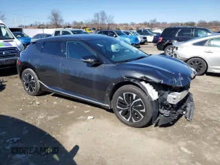2023 Kia EV6 Wind with VIN KNDC34LA3P5128827, listed as a Copart auction lot 48306745 with 21,974 mi miles and Non Repairable. Bid and sale history available at carsss.com. Image 4.