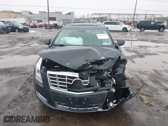 2013 Cadillac XTS Luxury z VIN 2G61R5S35D9100771, wystawiony jako IAAI lot #41673766 z przebiegiem 41 123 mil mil oraz . Historia ofert i sprzedaży dostępna na DreamBid. Obrazek 12.