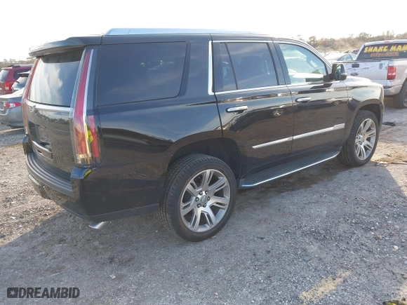 2018 Cadillac Escalade Luxury with VIN 1GYS3BKJ7JR291430, listed as a IAAI auction lot 41449233 with 128,281 mi miles. Bid and sale history available at carsss.com. Image 4.