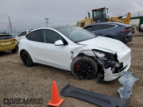 2024 Tesla Model Y Long Range with VIN 7SAYGAEE1RF061318, listed as a Copart auction lot 81142444 with 3,249 mi miles and Salvage Title. Bid and sale history available at DreamBid. Image 4.