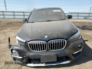 2019 BMW X1 xDrive28i with VIN WBXHT3C59K5L90348, listed as a Copart auction lot 48406515 with 66,292 mi miles and Salvage Title. Bid and sale history available at carsss.com. Image 5.