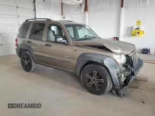 2004 Jeep Liberty Sport with VIN 1J4GL48KX4W115186, listed as a Copart auction lot 49231835 with 206,185 mi miles and Salvage Title. Bid and sale history available at carsss.com. Image 4.