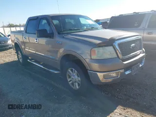 2004 Ford F-150 XLT with VIN 1FTPW14584KC35765, listed as a IAAI auction lot 41249586 with 322,715 mi miles. Bid and sale history available at carsss.com. Image 1.