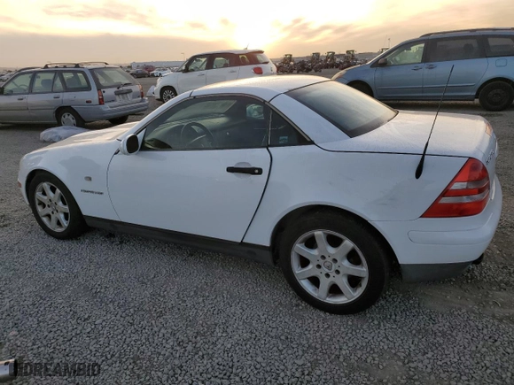 2000 Mercedes-Benz SLK-Class Kompressor with VIN WDBKK47F8YF169677, listed as a Copart auction lot 88743035 with 141,680 mi miles and Salvage Title. Bid and sale history available at carsss.com. Image 2.
