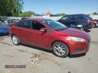2017 Ford Focus SE with VIN 1FADP3F23HL274056, listed as a Copart auction lot 55743865 with 52,790 mi miles and Salvage title. Bid and sale history available at DreamBid. Image 4.
