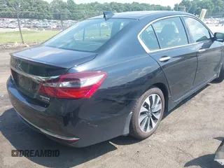 2017 Honda Accord Touring with VIN JHMCR6F74HC005706, listed as a IAAI auction lot 42585878 with 158,388 mi miles and . Bid and sale history available at DreamBid. Image 4.