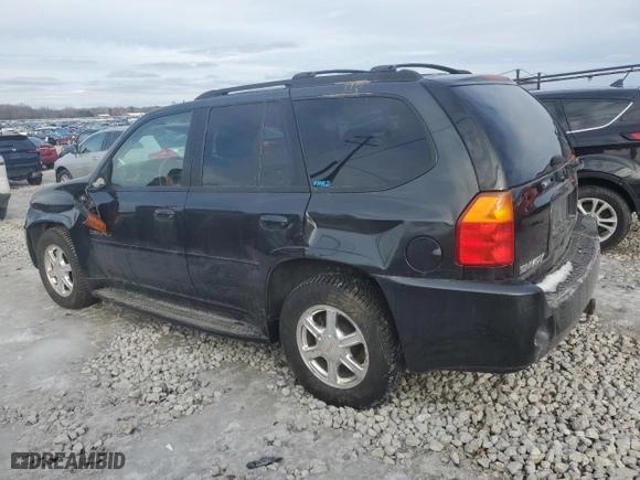 2005 GMC Envoy Denali with VIN 1GKET63M652353972, listed as a Copart auction lot 43690635 with 113,630 mi miles and Clean Title. Bid and sale history available at carsss.com. Image 2.