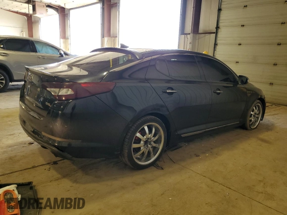2013 Kia Optima SX с VIN 5XXGR4A69DG129650, выставлен на аукционе Copart как лот 50353705 с пробегом 231 319 миль миль и Списание • Salvage title. История ставок и продаж доступна на DreamBid. Изображение 3.