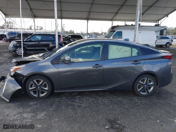 2022 Toyota Prius L Eco with VIN JTDKAMFU7N3155268, listed as a IAAI auction lot 41589024 with 158,430 mi miles. Bid and sale history available at carsss.com. Image 14.