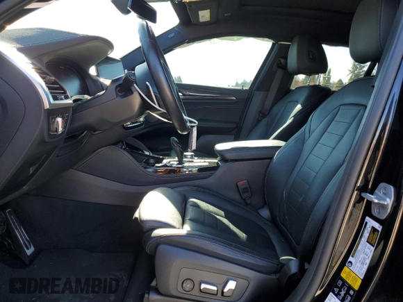 2021 BMW X4 M40i с VIN 5UX2V5C01M9F24036, выставлен на аукционе Copart как лот 74834364 с пробегом 38 185 миль миль и Списание • Salvage title. История ставок и продаж доступна на DreamBid. Изображение 7.