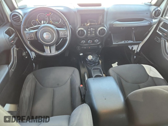 2015 Jeep Wrangler Unlimited Freedom with VIN 1C4HJWDGXFL755528, listed as a Copart auction lot 64927525 with 111,096 mi miles and Salvage title. Bid and sale history available at DreamBid. Image 8.