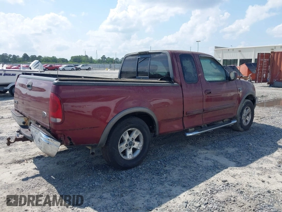 2003 Ford F-150 XL with VIN 2FTRX18L63CA45335, listed as a IAAI auction lot 42143835 with 185,036 mi miles and . Bid and sale history available at DreamBid. Image 4.