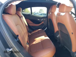 2019 Jaguar I-Pace SE z VIN SADHC2S18K1F73762, wystawiony jako Copart lot #49235464 z przebiegiem 43 376 mil mil oraz . Historia ofert i sprzedaży dostępna na DreamBid. Obrazek 10.