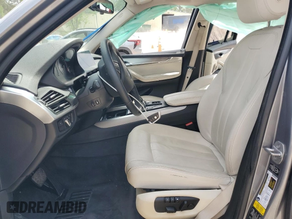 2014 BMW X5 xDrive35i z VIN 5UXKR0C54E0K46819, wystawiony jako Copart lot #54607325 z przebiegiem 135 489 mil mil oraz Szkody całkowita. Historia ofert i sprzedaży dostępna na DreamBid. Obrazek 7.