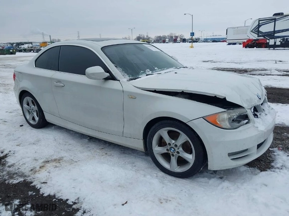2011 BMW 1 Series 128i with VIN WBAUP7C58BVP21425, listed as a IAAI auction lot 41356054 with 102,136 mi miles. Bid and sale history available at carsss.com. Image 1.