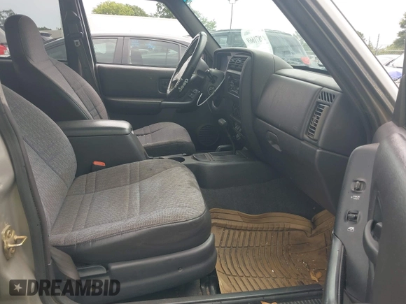 2000 Jeep Cherokee with VIN 1J4FF48S7YL220827, listed as a IAAI auction lot 42871669 with 146,466 mi miles and . Bid and sale history available at DreamBid. Image 5.