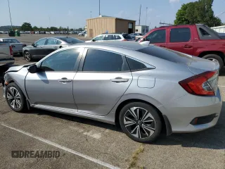 2017 Honda Civic EX-T with VIN 19XFC1E38HE013981, listed as a Copart auction lot 69820144 with 114,893 mi miles and Salvage Title. Bid and sale history available at DreamBid. Image 2.