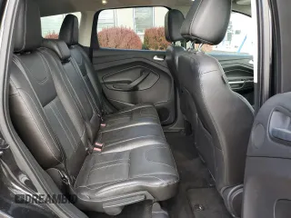 2013 Ford Escape Titanium z VIN 1FMCU0J96DUD76873, wystawiony jako Copart lot #52934235 z przebiegiem 141 834 mil mil oraz Szkody całkowita. Historia ofert i sprzedaży dostępna na DreamBid. Obrazek 11.