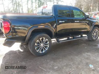 2023 GMC Canyon 4WD Denali with VIN 1GTP6FEK9P1146606, listed as a IAAI auction lot 41330983 with 18,907 mi miles and . Bid and sale history available at DreamBid. Image 4.