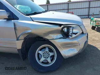 2004 Honda Pilot EX with VIN 2HKYF18434H501925, listed as a IAAI auction lot 42115835 with 271,091 mi miles and . Bid and sale history available at DreamBid. Image 6.