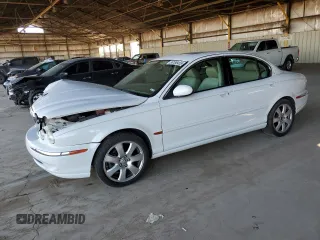 2004 Jaguar X-Type z VIN SAJEA51CX4WD83915, wystawiony jako Copart lot #56186455 z przebiegiem 112 932 mil mil oraz Szkoda całkowita • Salvage title. Historia ofert i sprzedaży dostępna na DreamBid. Obrazek 1.