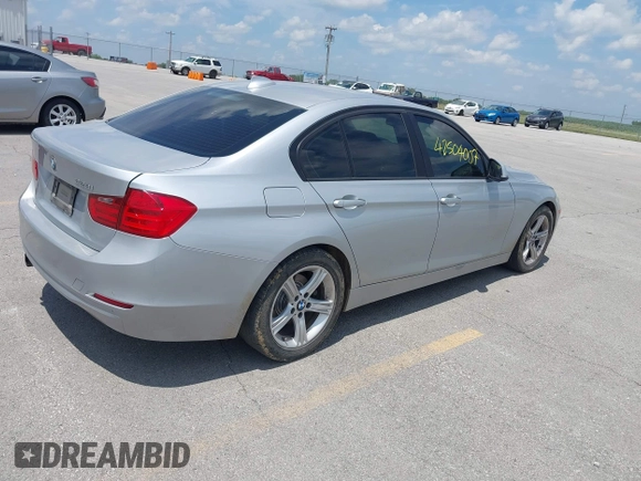 2013 BMW 3 Series 328i with VIN WBA3C1G5XDNR45054, listed as a IAAI auction lot 42504007 with 152,705 mi miles and . Bid and sale history available at DreamBid. Image 4.