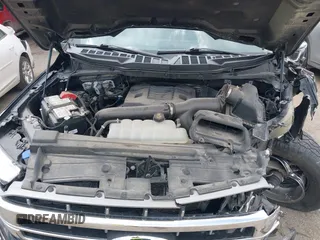 2023 Ford F-150 XL with VIN 1FTFW1E80PKF94617, listed as a IAAI auction lot 42492881 with 27,970 mi miles and . Bid and sale history available at DreamBid. Image 10.