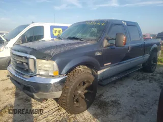 2003 Ford F-350 with VIN 1FTSW30PX3EC59706, listed as a Copart auction lot 74680424 with 155,093 mi miles and Salvage title. Bid and sale history available at DreamBid. Image 1.