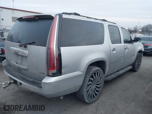 2011 Chevrolet Suburban LS with VIN 1GNSCHE07BR241468, listed as a IAAI auction lot 41376362 with 277,907 mi miles. Bid and sale history available at carsss.com. Image 4.
