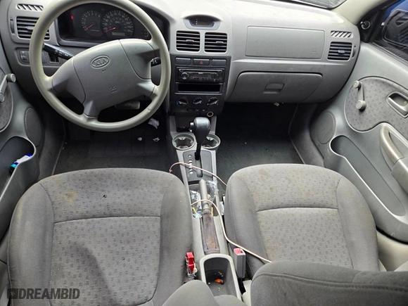 2004 Kia Rio with VIN KNADC125546325654, listed as a Copart auction lot 65521594 with 157,436 mi miles and Salvage Title. Bid and sale history available at carsss.com. Image 7.