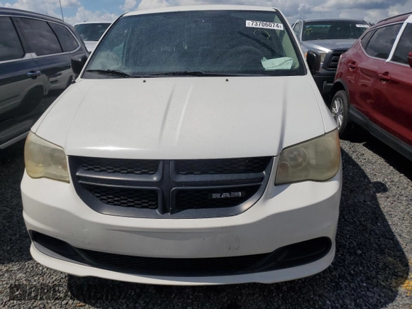 2012 Ram Cargo Van with VIN 2C4JDGAG9CR176648, listed as a Copart auction lot 73706074 with 0 mi miles and Salvage Title. Bid and sale history available at carsss.com. Image 5.