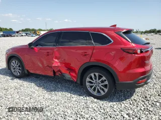 2023 Mazda CX-9 Grand Touring z VIN JM3TCBDY4P0633408, wystawiony jako Copart lot #57242685 z przebiegiem 28 859 mil mil oraz Szkoda całkowita • Salvage title. Historia ofert i sprzedaży dostępna na DreamBid. Obrazek 2.