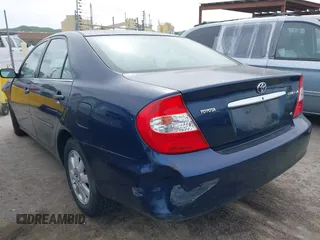 2004 Toyota Camry LE with VIN 4T1BF30K44U069441, listed as a IAAI auction lot 41740124 with 145,906 mi miles. Bid and sale history available at carsss.com. Image 3.
