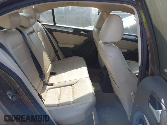 2014 Volkswagen Jetta SE with VIN 3VWD17AJ7EM385606, listed as a IAAI auction lot 42575046 with 86,889 mi miles and . Bid and sale history available at DreamBid. Image 8.