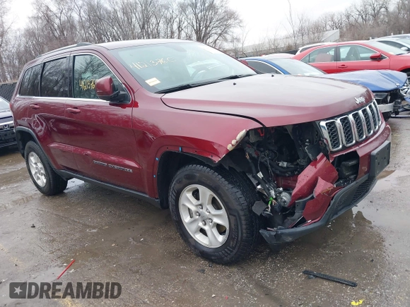 2017 Jeep Grand Cherokee Laredo with VIN 1C4RJFAG2HC682716, listed as a IAAI auction lot 41213760 with 116,519 mi miles. Bid and sale history available at carsss.com. Image 1.