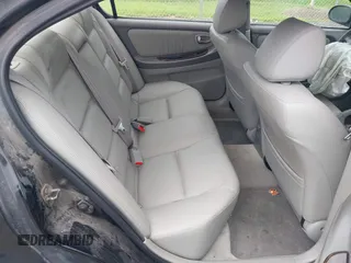 2002 Nissan Maxima GXE with VIN JN1DA31D52T429057, listed as a IAAI auction lot 42771435 with 122,398 mi miles and . Bid and sale history available at DreamBid. Image 8.