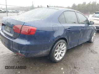 2011 Volkswagen Jetta Sedan SE w/Convenience & Sunroof PZEV with VIN 3VWDZ7AJ6BM326180, listed as a IAAI auction lot 41978482 with 137,189 mi miles. Bid and sale history available at carsss.com. Image 4.