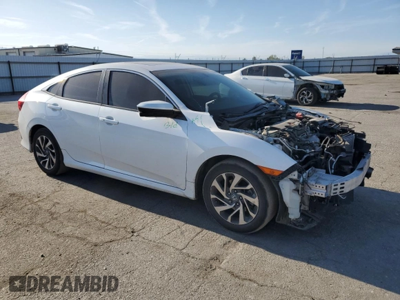 2017 Honda Civic EX z VIN 19XFC2F75HE201784, wystawiony jako Copart lot #53881115 z przebiegiem 135 348 mil mil oraz Szkoda całkowita • Salvage title. Historia ofert i sprzedaży dostępna na DreamBid. Obrazek 4.