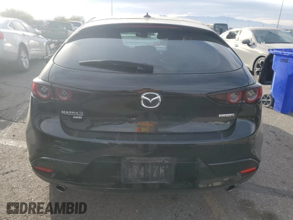 2019 Mazda Mazda3 Hatchback w/Preferred Pkg with VIN JM1BPBMM1K1123347, listed as a Copart auction lot 87330764 with 31,189 mi miles and Salvage Title. Bid and sale history available at carsss.com. Image 6.