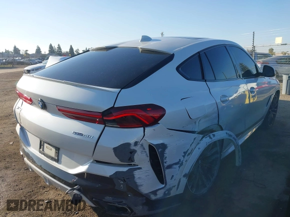 2021 BMW X6 sDrive40i z VIN 5UXCY4C06M9E16162, wystawiony jako IAAI lot #41279040 z przebiegiem 94 494 mil mil oraz . Historia ofert i sprzedaży dostępna na DreamBid. Obrazek 4.