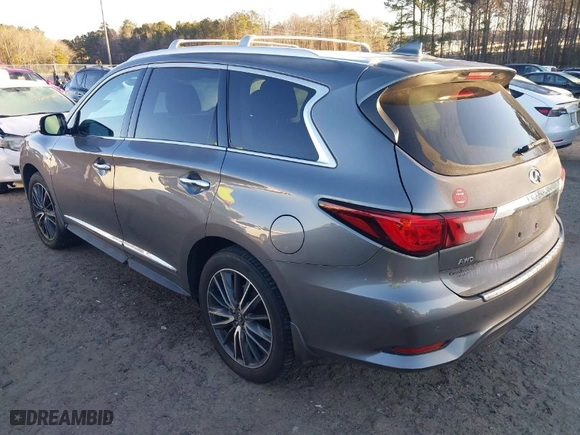 2020 Infiniti QX60 LUXE with VIN 5N1DL0MMXLC506990, listed as a IAAI auction lot 41307122 with 83,657 mi miles. Bid and sale history available at carsss.com. Image 3.