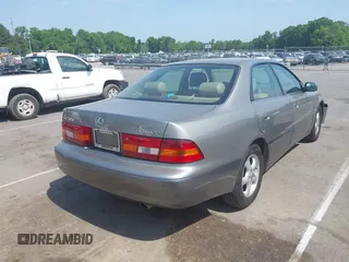 1998 Lexus ES 300 with VIN JT8BF28G3W5031533, listed as a IAAI auction lot 42132801 with 243,178 mi miles and . Bid and sale history available at DreamBid. Image 4.