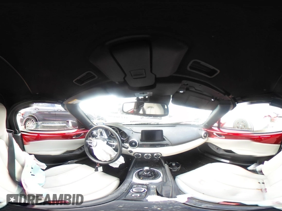 2021 Mazda MX-5 Miata Grand Touring with VIN JM1NDAD79M0454079, listed as a IAAI auction lot 41230199 with 104,783 mi miles and . Bid and sale history available at DreamBid. Image 18.