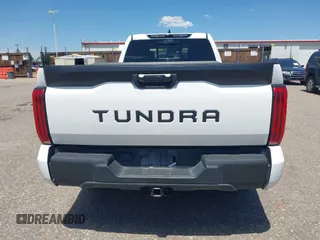 2022 Toyota Tundra with VIN 5TFKB5CDXNX001458, listed as a IAAI auction lot 42640278 with 51,718 mi miles and . Bid and sale history available at DreamBid. Image 16.